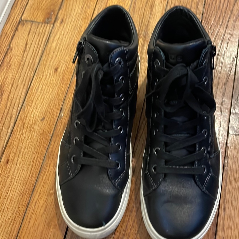 COPY - COPY - Taos black leather high top sneakers.